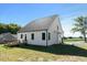 Side view of home shows a wooden deck in the backyard at 1467 Antioch Church Rd, Timberlake, NC 27583