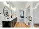 Elegant bathroom with a double vanity and modern fixtures; leads to a bedroom and shower at 1467 Antioch Church Rd, Timberlake, NC 27583