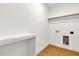 Functional laundry room with a countertop, overhead storage, and connections for appliances at 1467 Antioch Church Rd, Timberlake, NC 27583