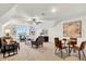 Open-concept room with built-in bookshelves, comfortable seating, and natural light at 1467 Antioch Church Rd, Timberlake, NC 27583