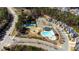 Community amenities include pool, tennis court, and playground; with neighborhood homes in the background at 1922 Pattersons Mill Rd, Durham, NC 27703