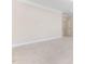 Spacious bedroom featuring neutral walls and beige carpeting at 1922 Pattersons Mill Rd, Durham, NC 27703