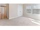 Cozy bedroom with plush carpeting and natural light at 1922 Pattersons Mill Rd, Durham, NC 27703