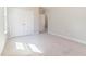 Bedroom with white walls, closet, and neutral carpet at 1922 Pattersons Mill Rd, Durham, NC 27703