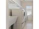 Laundry room featuring a utility sink, washer, and dryer at 1922 Pattersons Mill Rd, Durham, NC 27703