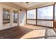 Screened porch provides an outdoor space with doors to the house at 1922 Pattersons Mill Rd, Durham, NC 27703