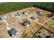 Aerial view of multiple homes, illustrating the community's layout and surroundings at 20 Wildflower Ln, Franklinton, NC 27525