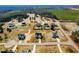 Aerial view of a community featuring well-maintained homes, spacious yards, and tree-lined streets at 20 Wildflower Ln, Franklinton, NC 27525