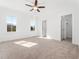 This spacious bedroom is brightly lit by two windows and features a ceiling fan at 20 Wildflower Ln, Franklinton, NC 27525