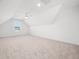 Large bonus room features neutral carpet, a ceiling fan, and a window with a view at 20 Wildflower Ln, Franklinton, NC 27525