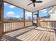 Relaxing screened porch featuring wood floors, ceiling fan and backyard views at 20 Wildflower Ln, Franklinton, NC 27525