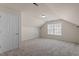 Spacious carpeted bedroom with a large window offering natural light at 2017 Ollivander Dr, Cary, NC 27519
