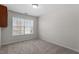 A light-filled bedroom offering plush carpeting and a bright window at 2017 Ollivander Dr, Cary, NC 27519