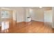Open floor plan with hardwood floors and neutral paint colors provides a flexible living space at 2017 Ollivander Dr, Cary, NC 27519