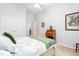 Relaxing bedroom featuring a plush bed, soft carpeting, and a serene atmosphere at 208 Abigail Ln, Gibsonville, NC 27249