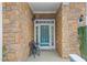 Charming stone porch with seating area, perfect for enjoying a quiet moment outdoors at 208 Abigail Ln, Gibsonville, NC 27249