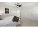 Bright primary bedroom features plush bed, neutral tones, and double closets at 237 Daniel Ridge Rd, Wendell, NC 27591