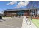 Community clubhouse showcasing modern architecture, landscaping, and bicycle parking at 237 Daniel Ridge Rd, Wendell, NC 27591