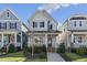 Charming two-story home with a welcoming front porch and well-manicured lawn at 237 Daniel Ridge Rd, Wendell, NC 27591
