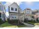 Charming home with a welcoming front porch, complemented by a well-maintained lawn and blue skies at 237 Daniel Ridge Rd, Wendell, NC 27591