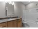 Bathroom vanity with sink and shower/tub combo at 25 Arbor Dr, Youngsville, NC 27596