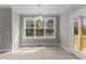 Dining area with bright natural light at 25 Arbor Dr, Youngsville, NC 27596
