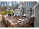Spacious backyard deck with multiple seating areas, perfect for outdoor entertaining and relaxation at 260 Culbreth Rd, Chapel Hill, NC 27516