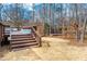 Backyard view showcasing wood deck, steps, and yard at 260 Culbreth Rd, Chapel Hill, NC 27516