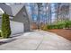 Long driveway leading to a spacious garage with a basketball hoop for recreational fun at 260 Culbreth Rd, Chapel Hill, NC 27516