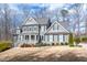 Beautiful two-story home with well-maintained landscaping, charming accents, and classic design at 260 Culbreth Rd, Chapel Hill, NC 27516