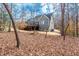 Exterior home view of home with deck and wooded backyard at 260 Culbreth Rd, Chapel Hill, NC 27516