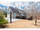 Exterior view showcasing the house, driveway, and backyard with sports equipment at 260 Culbreth Rd, Chapel Hill, NC 27516