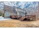 Expansive backyard features a multi-level deck, perfect for entertaining and enjoying the outdoors at 260 Culbreth Rd, Chapel Hill, NC 27516