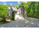 A two-car garage with driveway and beautiful landscaping, providing ample parking at 260 Culbreth Rd, Chapel Hill, NC 27516