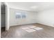 Bright bedroom featuring hardwood floors, double windows and white painted walls at 307 Gordon St, Roxboro, NC 27573