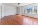 Spacious living room with hardwood floors, bright windows, and neutral-toned walls at 307 Gordon St, Roxboro, NC 27573