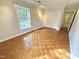 Bedroom with natural light, hardwood floors, and closet at 318 N Estes Dr, Chapel Hill, NC 27514