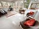 Cozy sunroom featuring lots of natural light and stylish furniture at 318 N Estes Dr, Chapel Hill, NC 27514