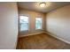 Bedroom featuring neutral carpet and natural light at 318 S Bend Dr, Durham, NC 27713
