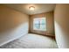 Bedroom featuring neutral carpet and natural light at 318 S Bend Dr, Durham, NC 27713