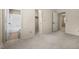 A bright bedroom provides access to both an ensuite bathroom and a walk-in closet at 3213 Coachmans Way, Durham, NC 27705