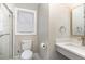 Bathroom featuring a walk-in shower, vanity, and a modern toilet at 328 Cleveland St, Rocky Mount, NC 27803