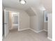 Room featuring neutral walls, carpet, and a doorway at 328 Cleveland St, Rocky Mount, NC 27803