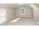 Room featuring neutral walls, carpet, and a window at 328 Cleveland St, Rocky Mount, NC 27803