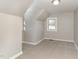 Room featuring neutral walls, carpet, and a window at 328 Cleveland St, Rocky Mount, NC 27803