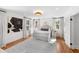 Bright bedroom with a patterned area rug, white walls, and an upholstered bed and custom nightstand at 330 Tenney Circle, Chapel Hill, NC 27514