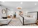 Spacious bedroom with neutral decor, sitting area, and decorative rug at 330 Tenney Circle, Chapel Hill, NC 27514