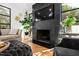 Living room showcases a sleek, dark fireplace with a mounted TV at 330 Tenney Circle, Chapel Hill, NC 27514