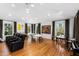 Entertainer's game room with a ping pong table, seating area, and hardwood floors at 330 Tenney Circle, Chapel Hill, NC 27514