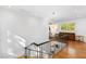 Hallway features hardwood flooring, decorative chandelier, and an abundance of natural light at 330 Tenney Circle, Chapel Hill, NC 27514